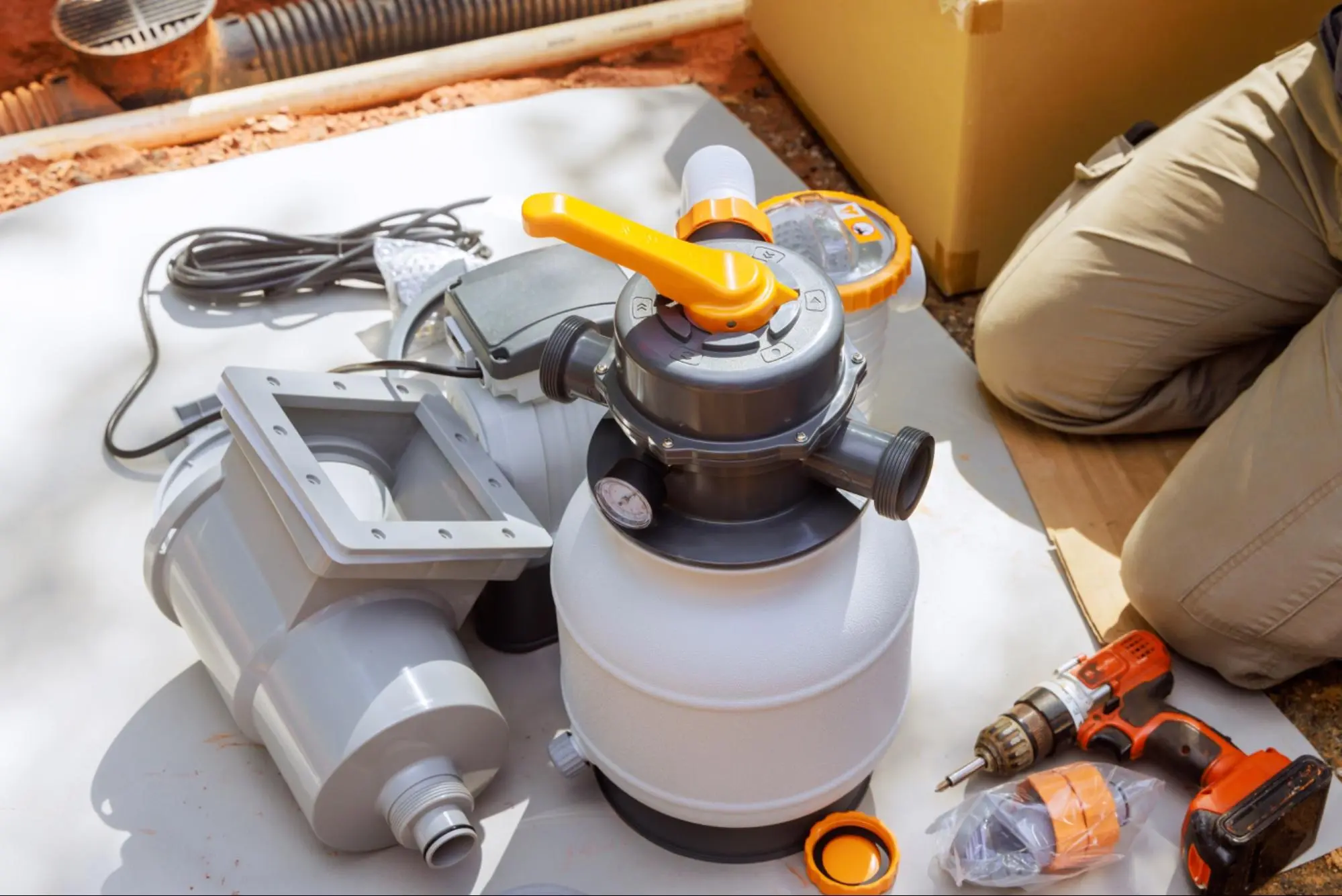 Technician working on broken pool pump